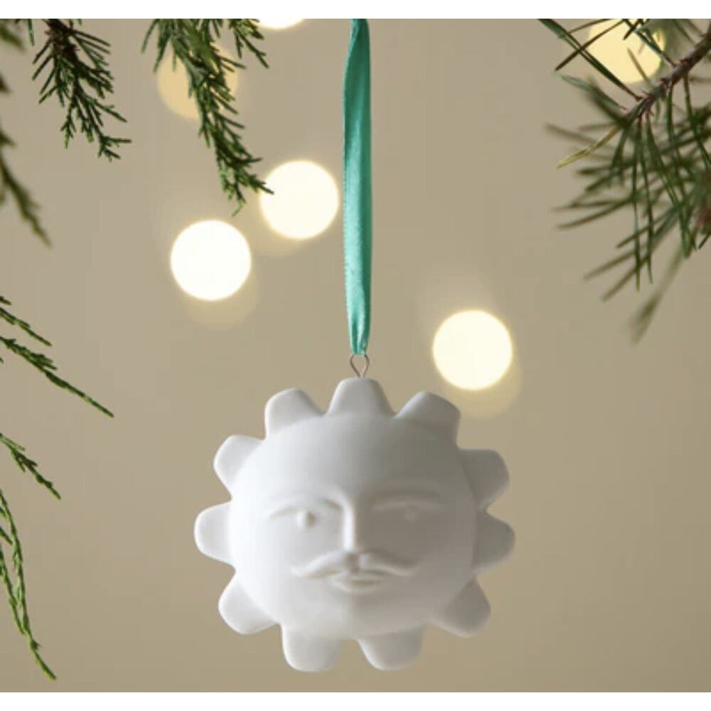 New in Box Jonathan Adler White Porcelain Sun Ornament. Two Faces!